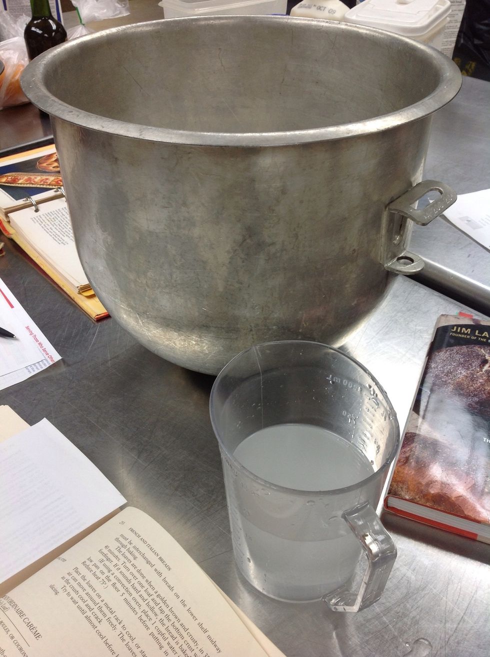 Add hot water to mixing bowl.