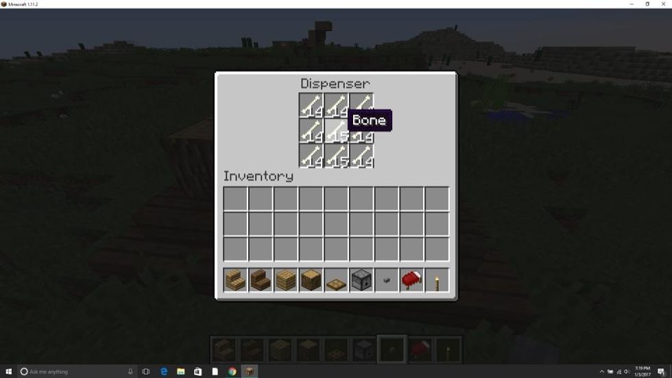 Add how ever many bones to the dispenser that you want (this is a treat dispenser for your dog).