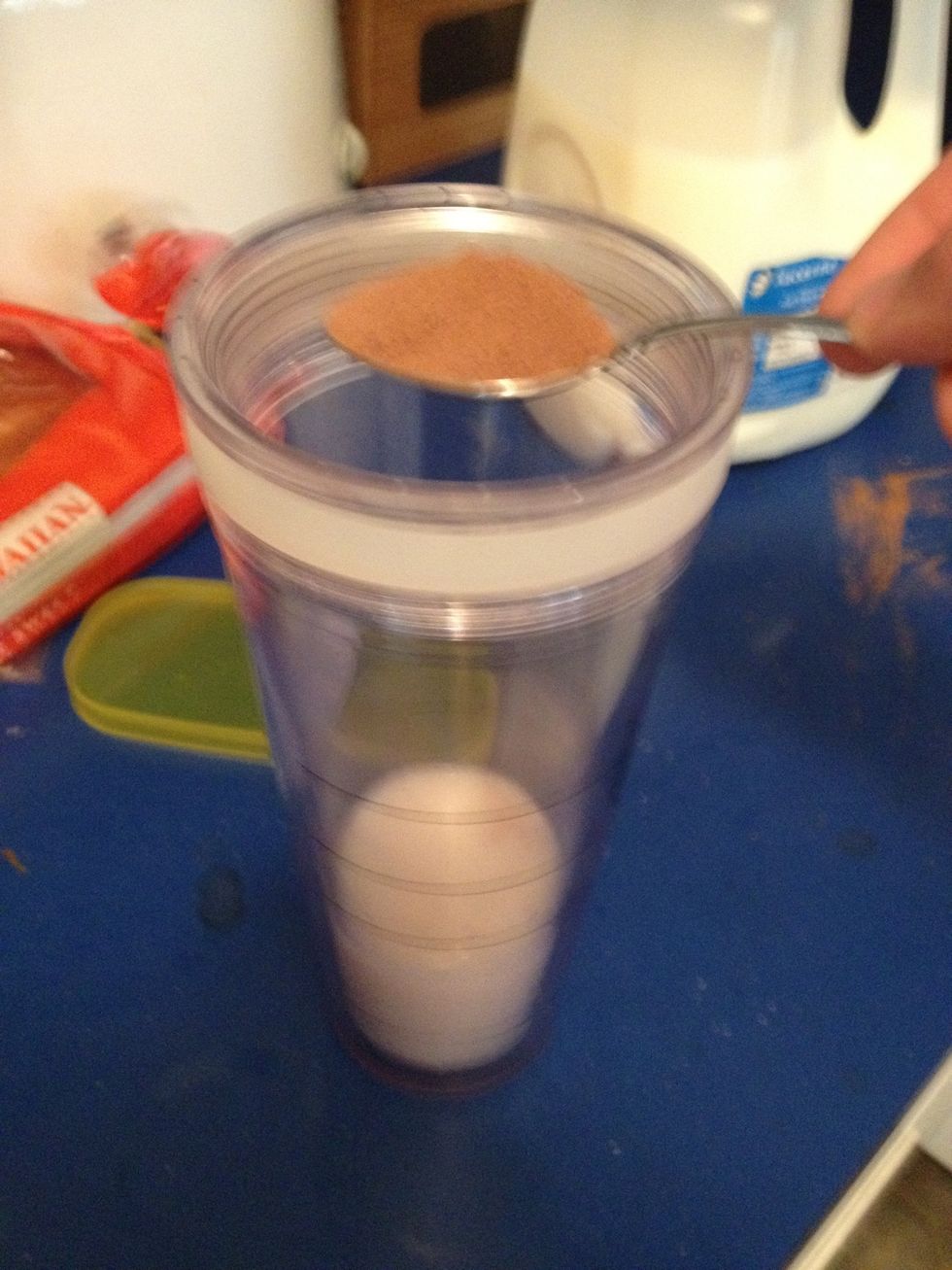 Add I heaping teaspoon of nesquick chocolate  powder.  Mix well.