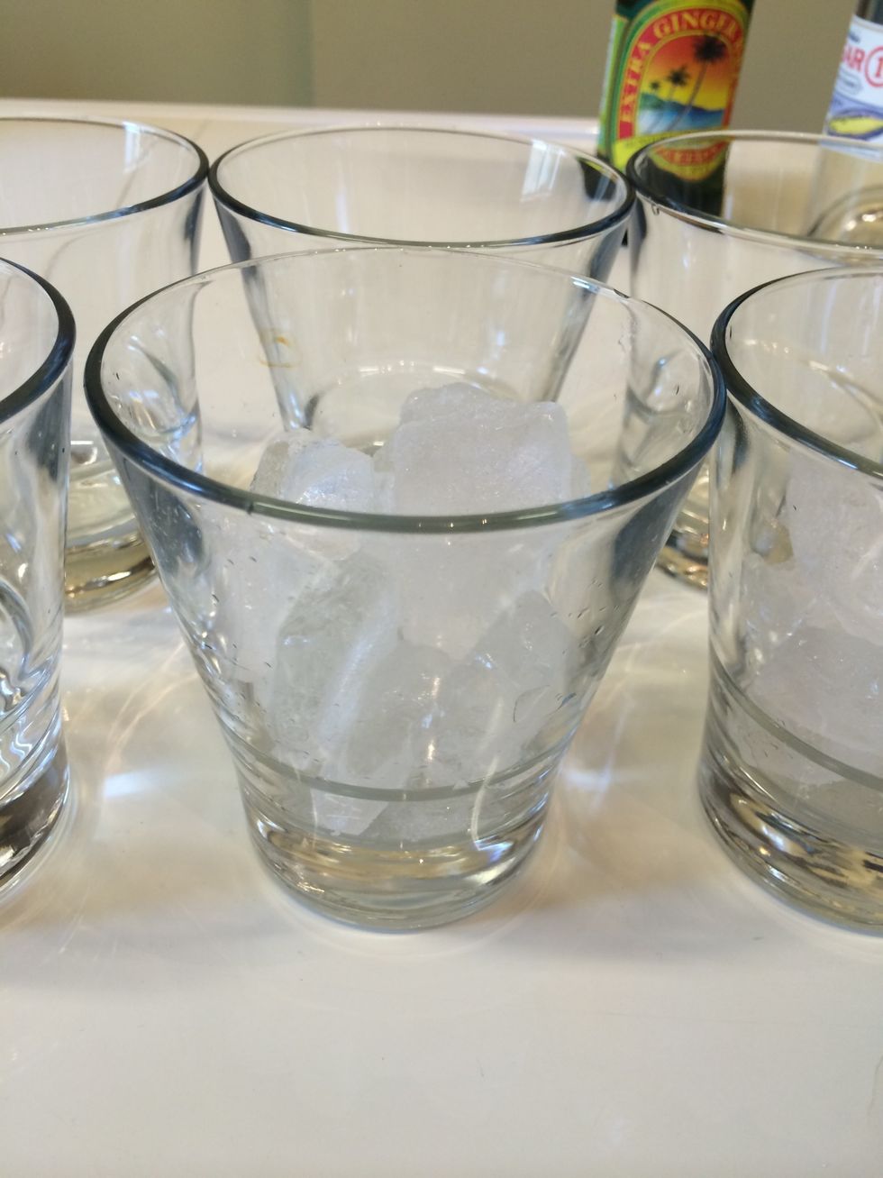 Add ice cubes to your cup.