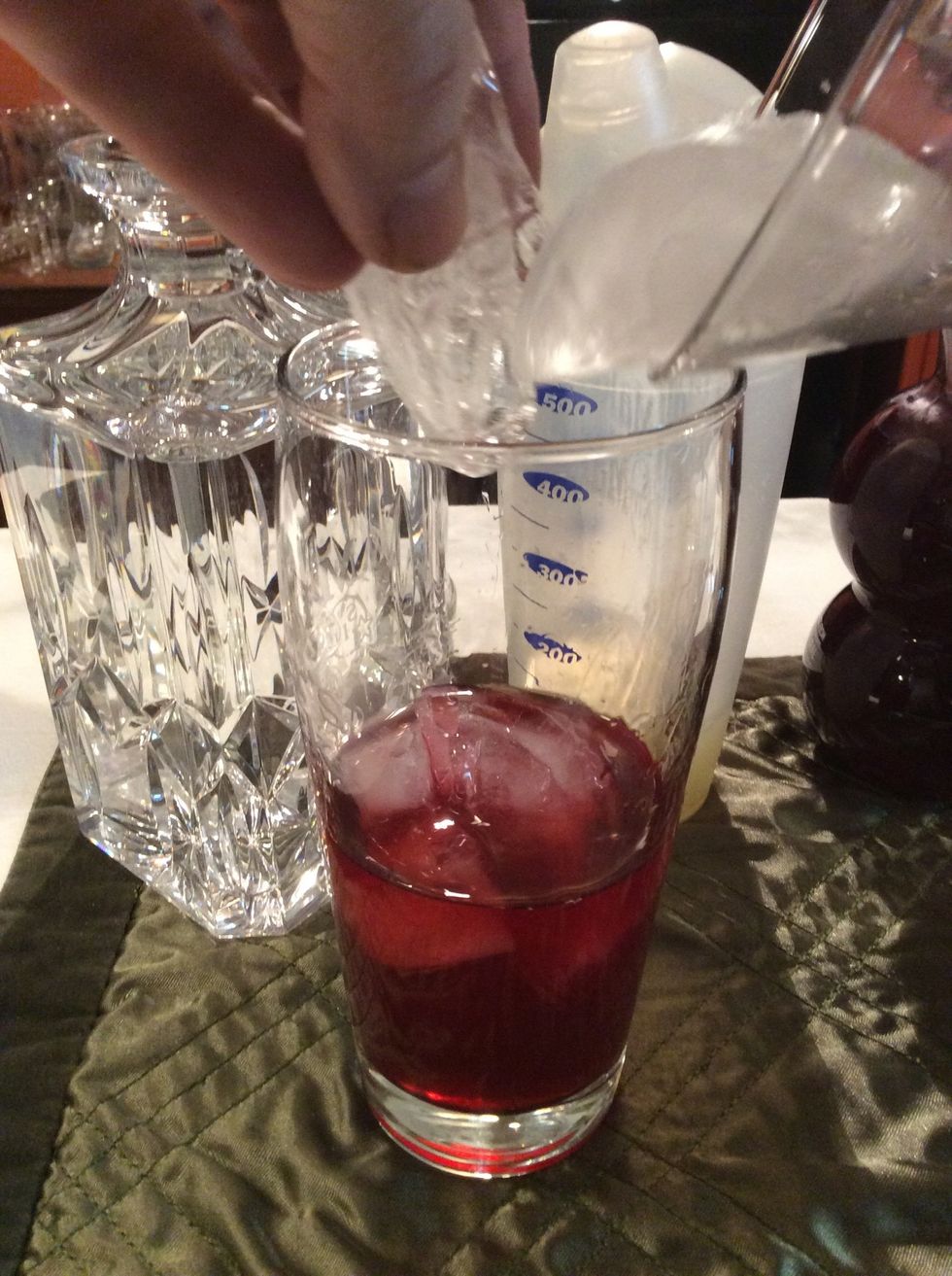 Add ice from chilling martini glass.