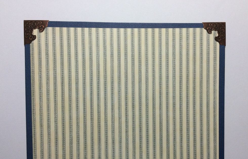 Add ideaology corners to all corners . Bend flaps over and hammer flat on reverse to secure in to position