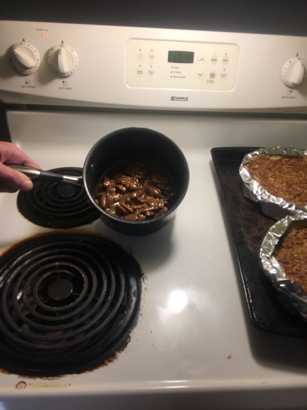 Add in 1 1/2 pecan halves and coat on to pie