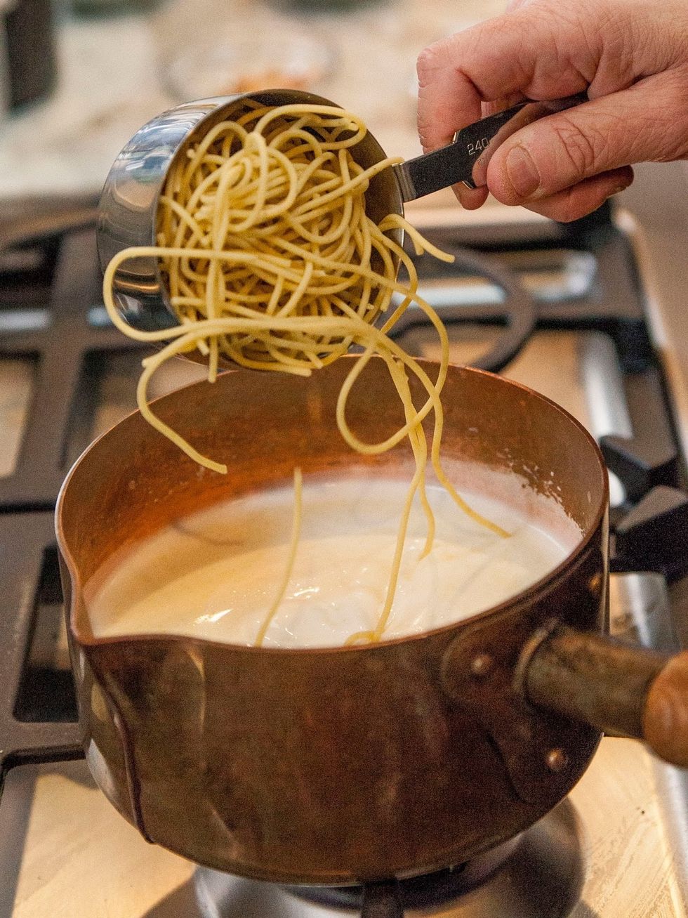 Add in 1 cup of pasta. Stir everything around and let the pasta cook. Fresh pasta takes only a few minutes. You want your pasta soft but not falling apart mushy.