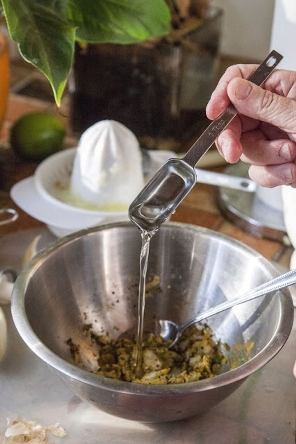Add in 1 Tbs of water to the ground mustard seeds.