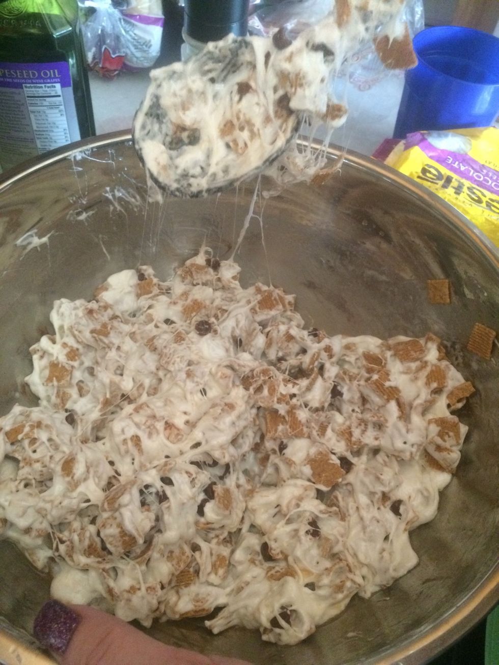 add in 2-3 cups of chocolate chips and the rest of the remaining golden grahams. mix well