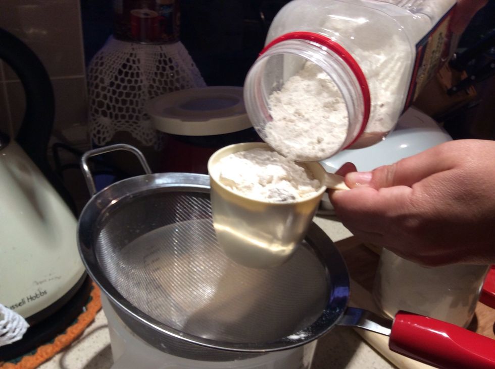 Add in 2 cups of self raising flour
