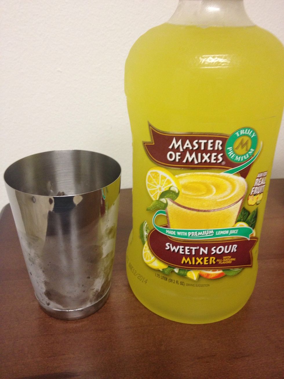 Add in 2 ounces of Sweet & Sour Mix.