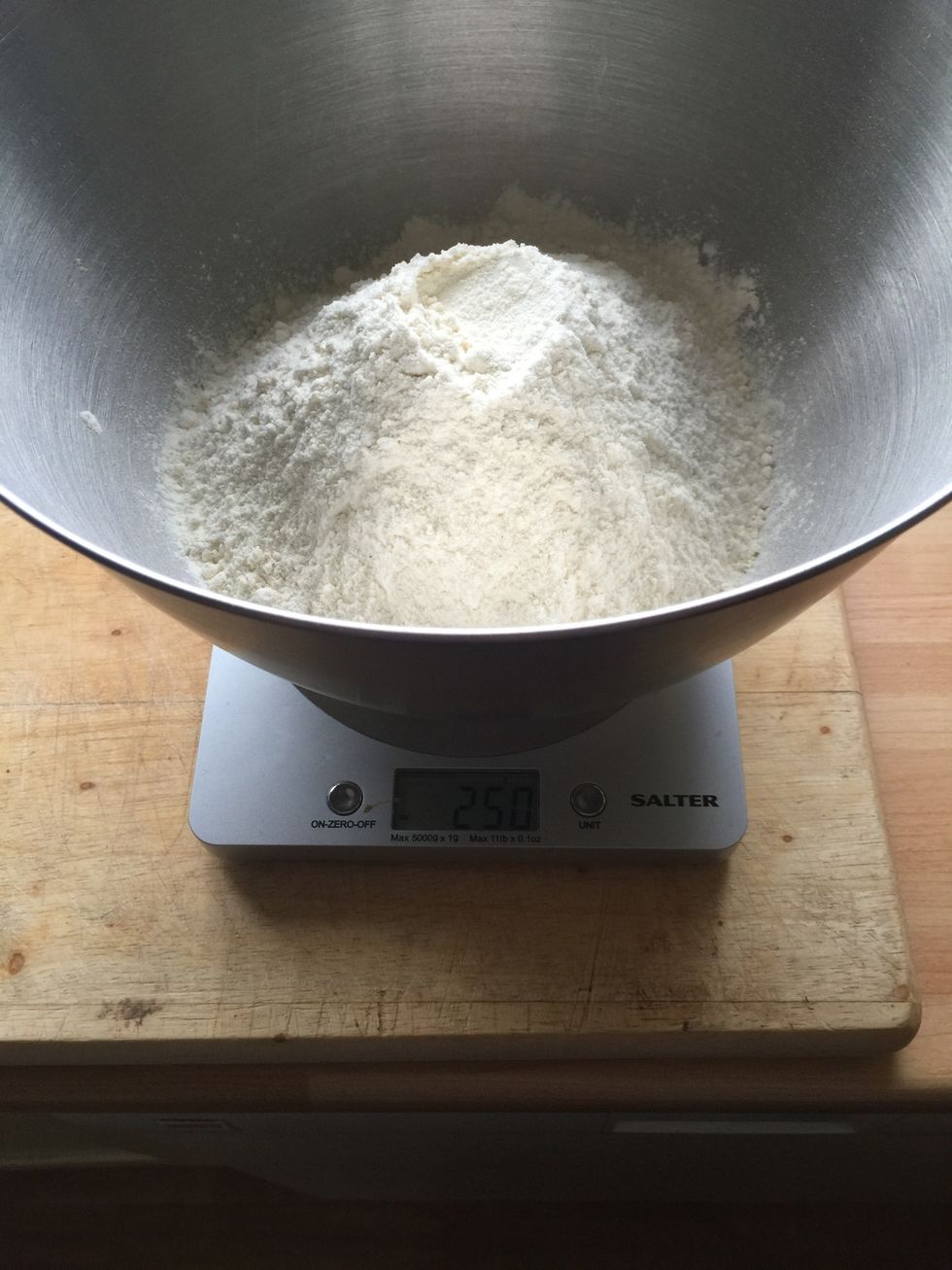Add in 250g of plain flour