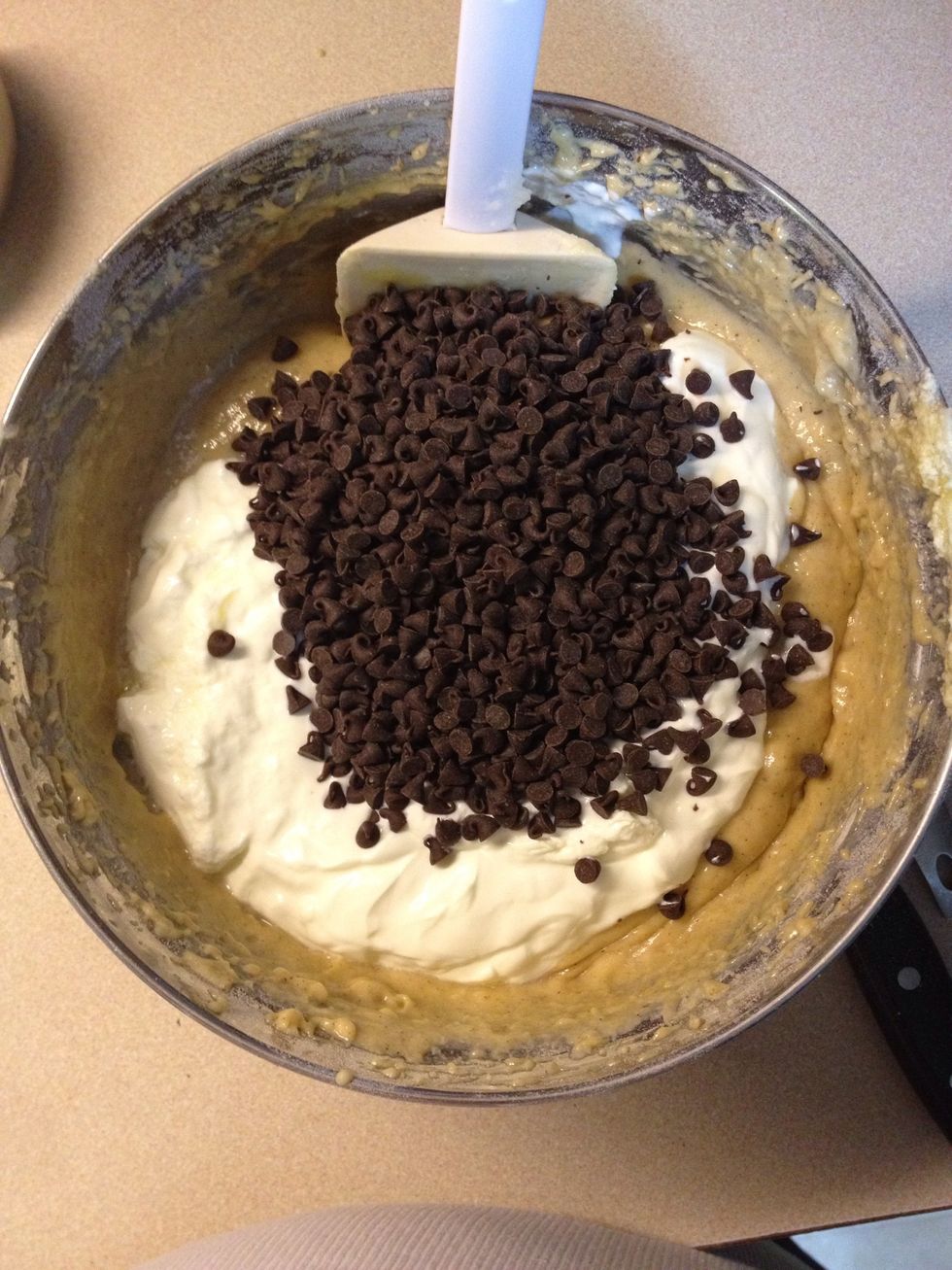 Add in 3/4 cup of sour cream and 1/2 cup of chocolate chips.