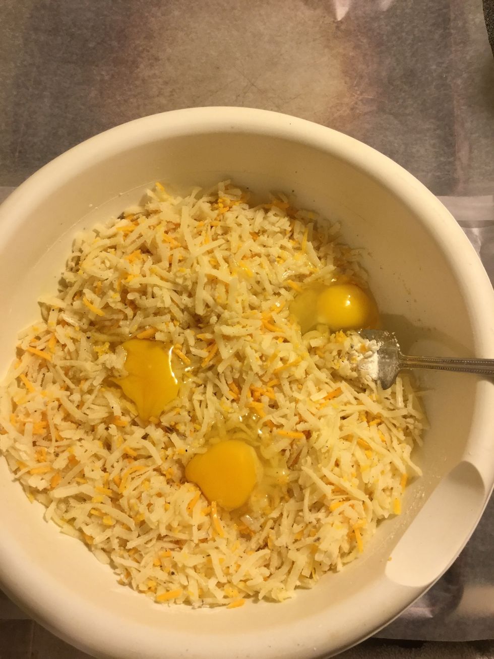 Add in 3 eggs and mix well.