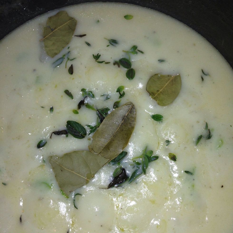 Add in a few bay leaves (I try to put in 1 for each pie so it can go inside when we scoop in the filling) Tyne, oregano, parsley, salt and pepper and stir it up