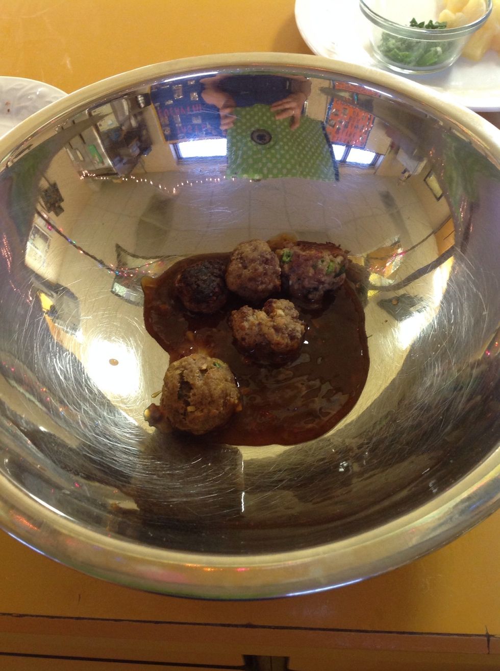 Add in all of your meatballs and coat in the sauce ( if you would like to serve this appetizer hot put the meatballs in the microwave for 1 minute).