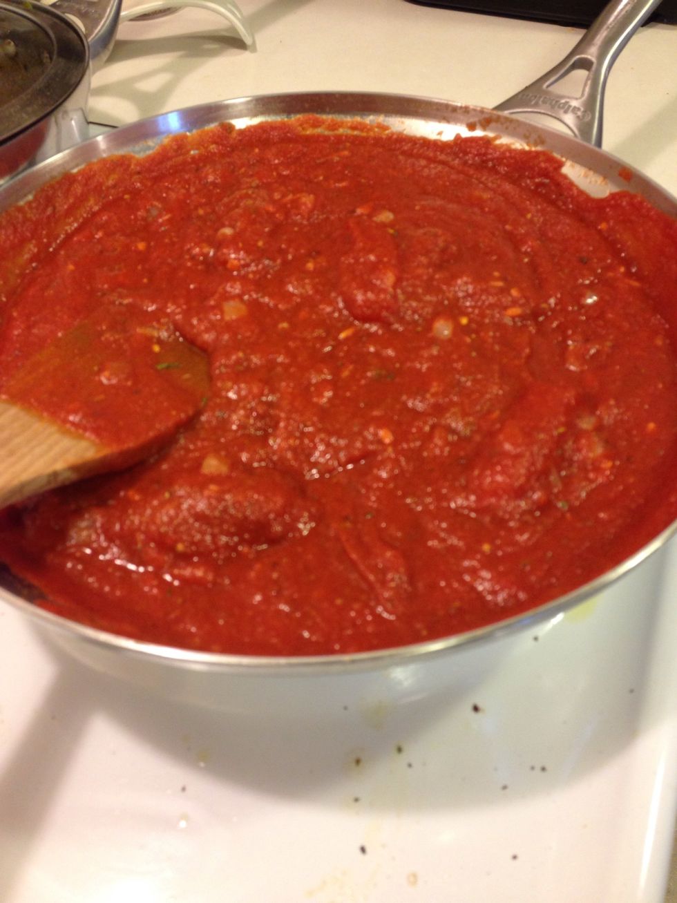 Add in all your tomato products, all of you dry herbs only, including salt and pepper ... amounts are up to you, but you can say about 1-2 tablespoons each and bring it to a boil