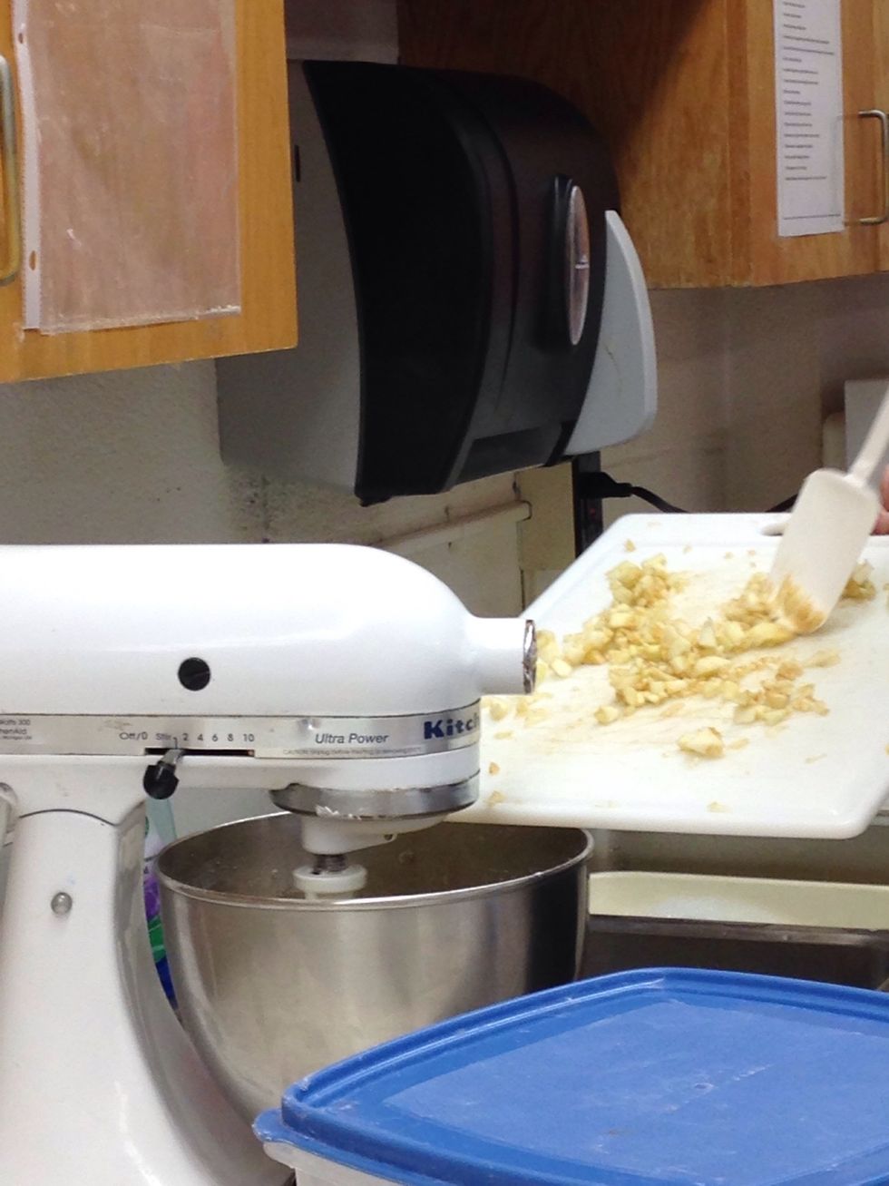 Add in apples into batter mix.