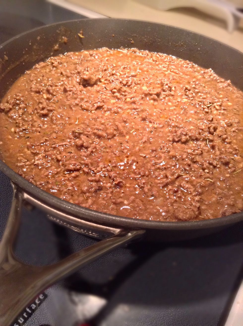 Add in beef broth, ketchup and beef gravy. In the picture above the meat mixture looks running, after about 5 minutes of cooking the meat mixture will thicken.