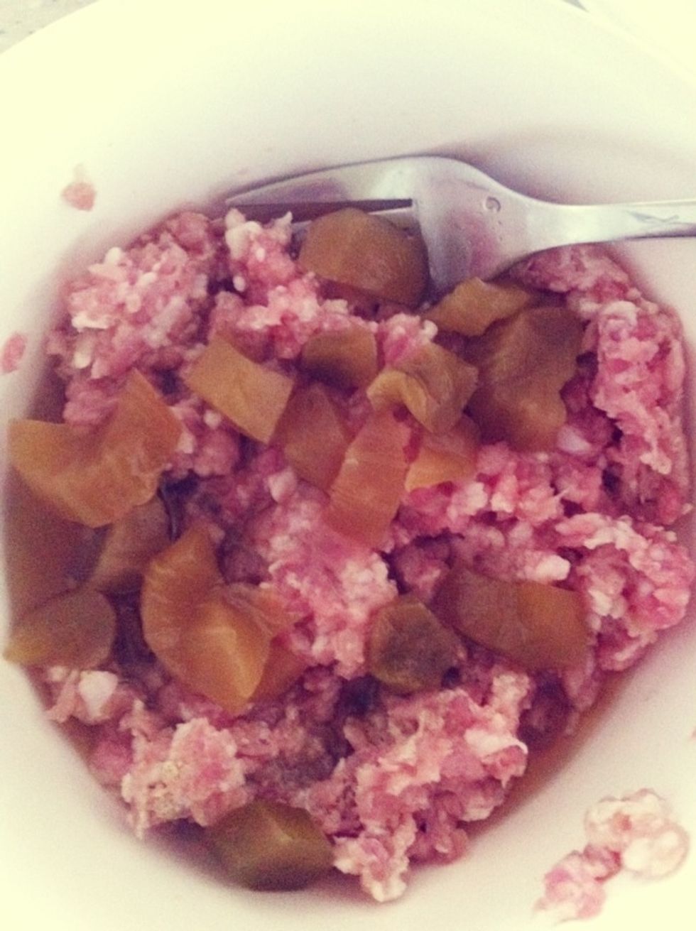 Add in canned caixin & 2tbs of the soya sauce from the can and mix well.