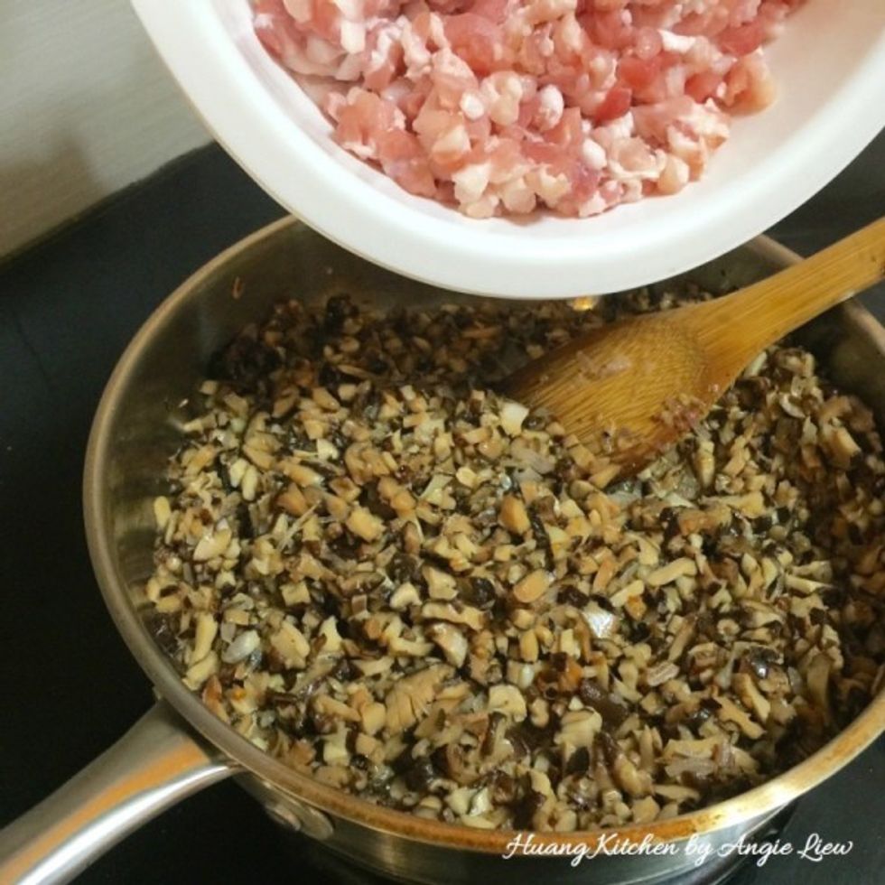 Add in diced mushrooms and pork.