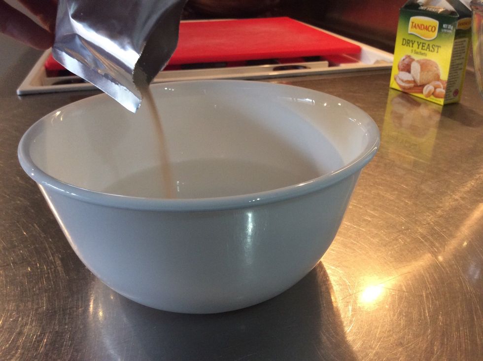 Add in dried yeast to water