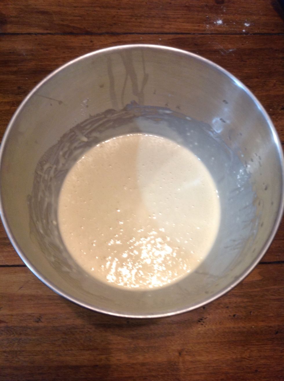 Add in flour, milk, vegetable oil, baking powder, white sugar, salt and vanilla extract into the bowl and mix until the waffle batter is smooth in consistency.
