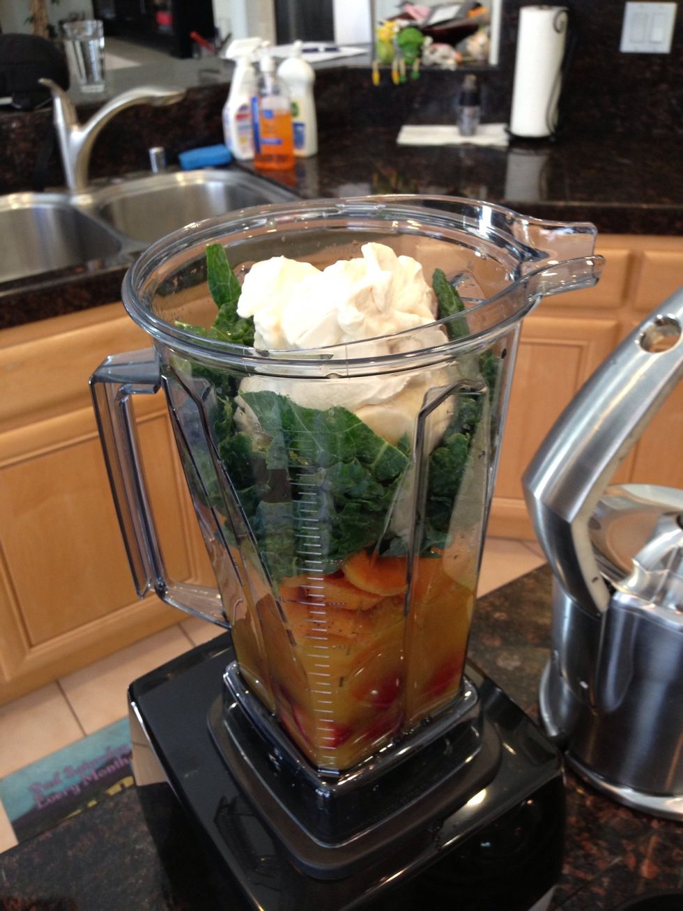 Add in Greek yogurt, honey and banana.