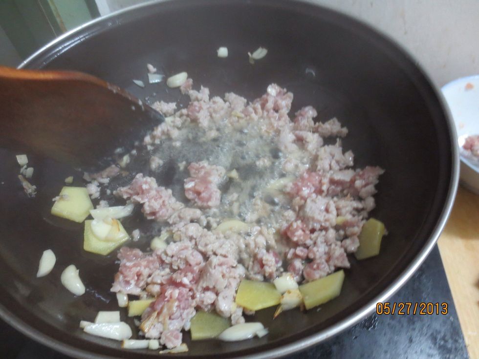 Add in ground pork and stir on medium