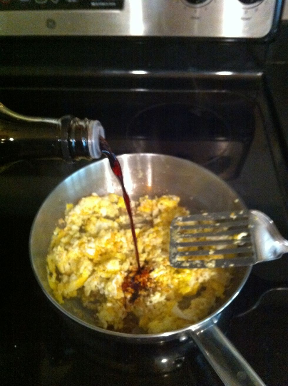 Add in low sodium soy sauce to deglaze and flavor egg. Add salt and pepper to taste
