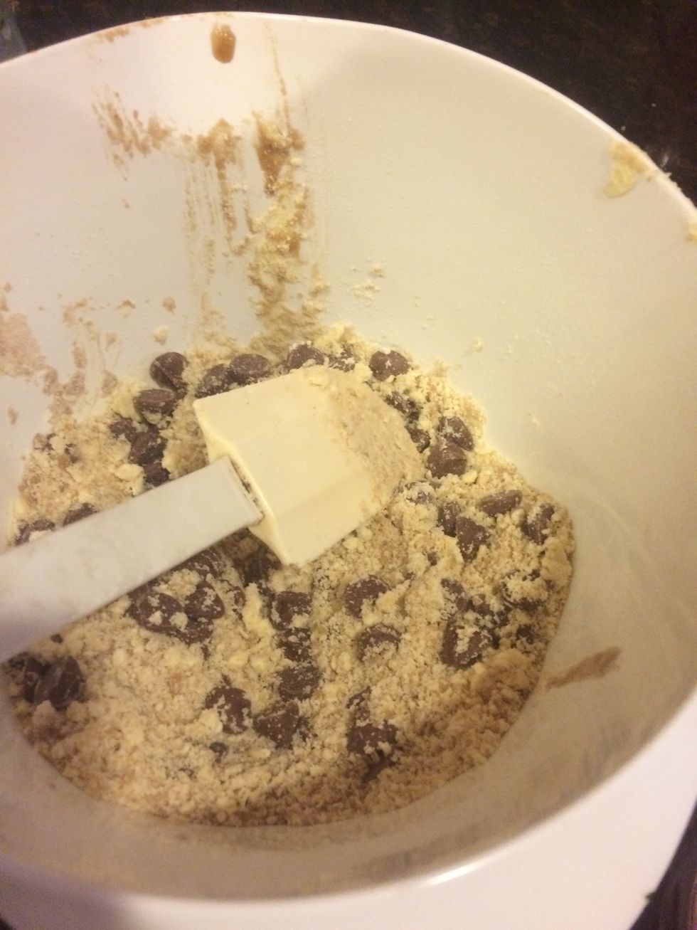 Add in milk chocolate chips and blend until the mixture resembles dough.
