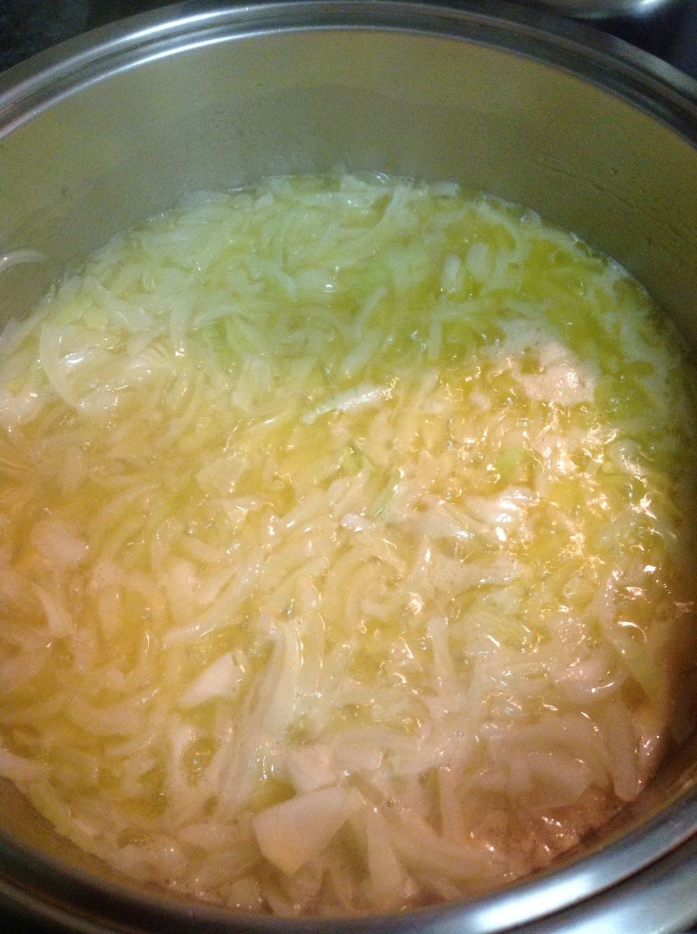Add in onions and braise until lightly golden