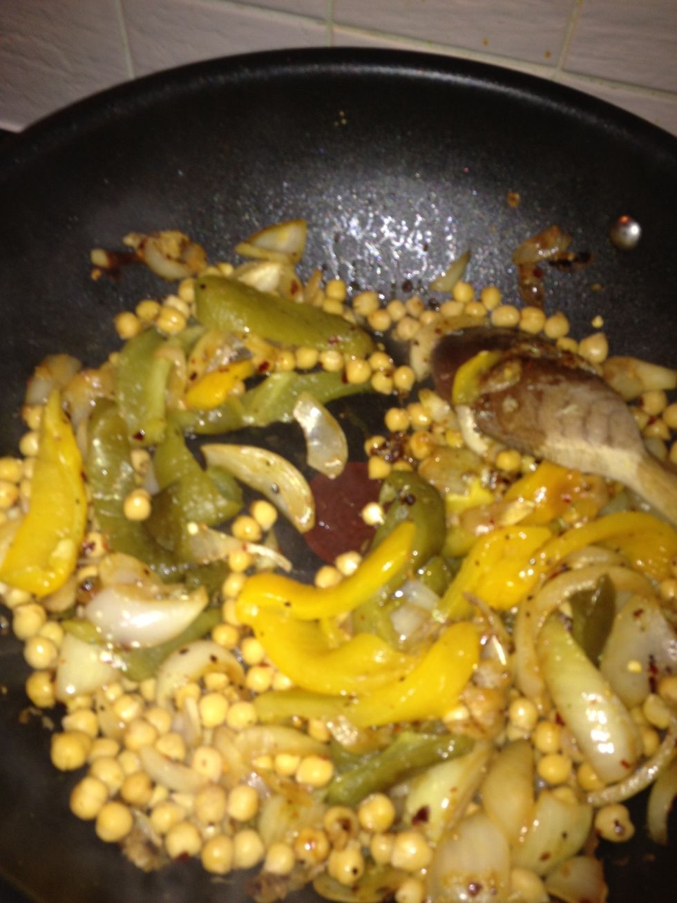 add in peppers, stir. lower heat right down.