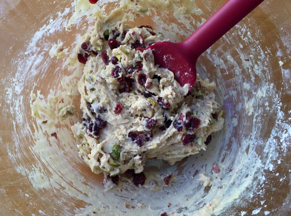 Add in pistachios and cranberries. Mix.
