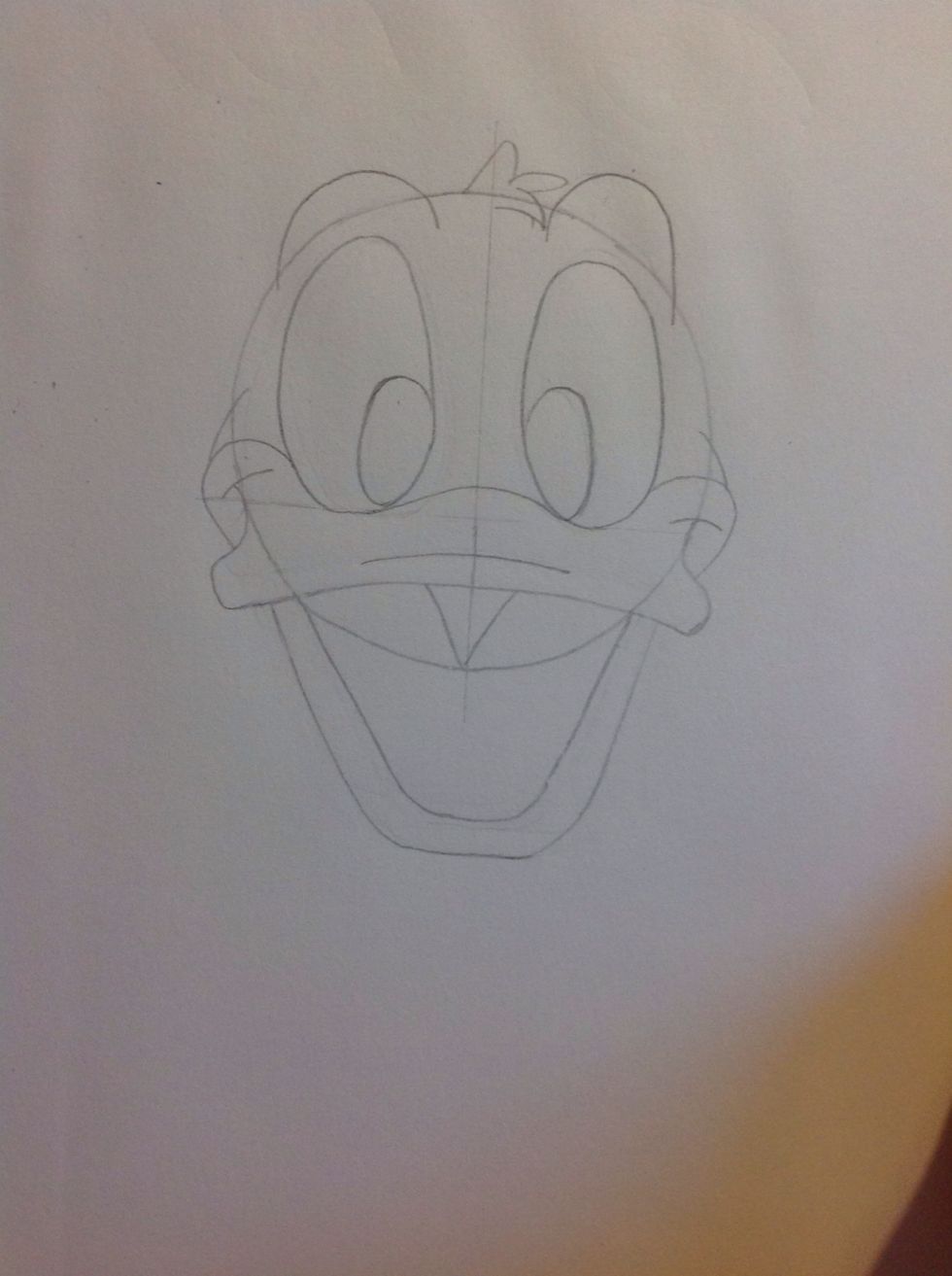 Add in small details (cheeks and tuft of hair)