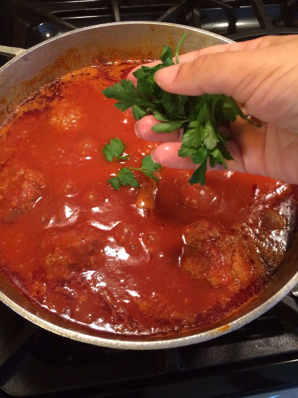 Add in some fresh parsley as well. Cook this for another 10 minutes and than shut off heat the to allow it to cool.