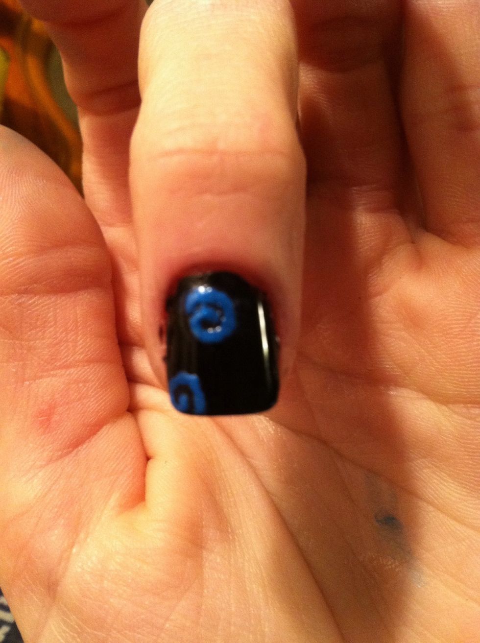Add in some swirls with a color of your choice. (I used Maybelline Color Show's Shockwave)