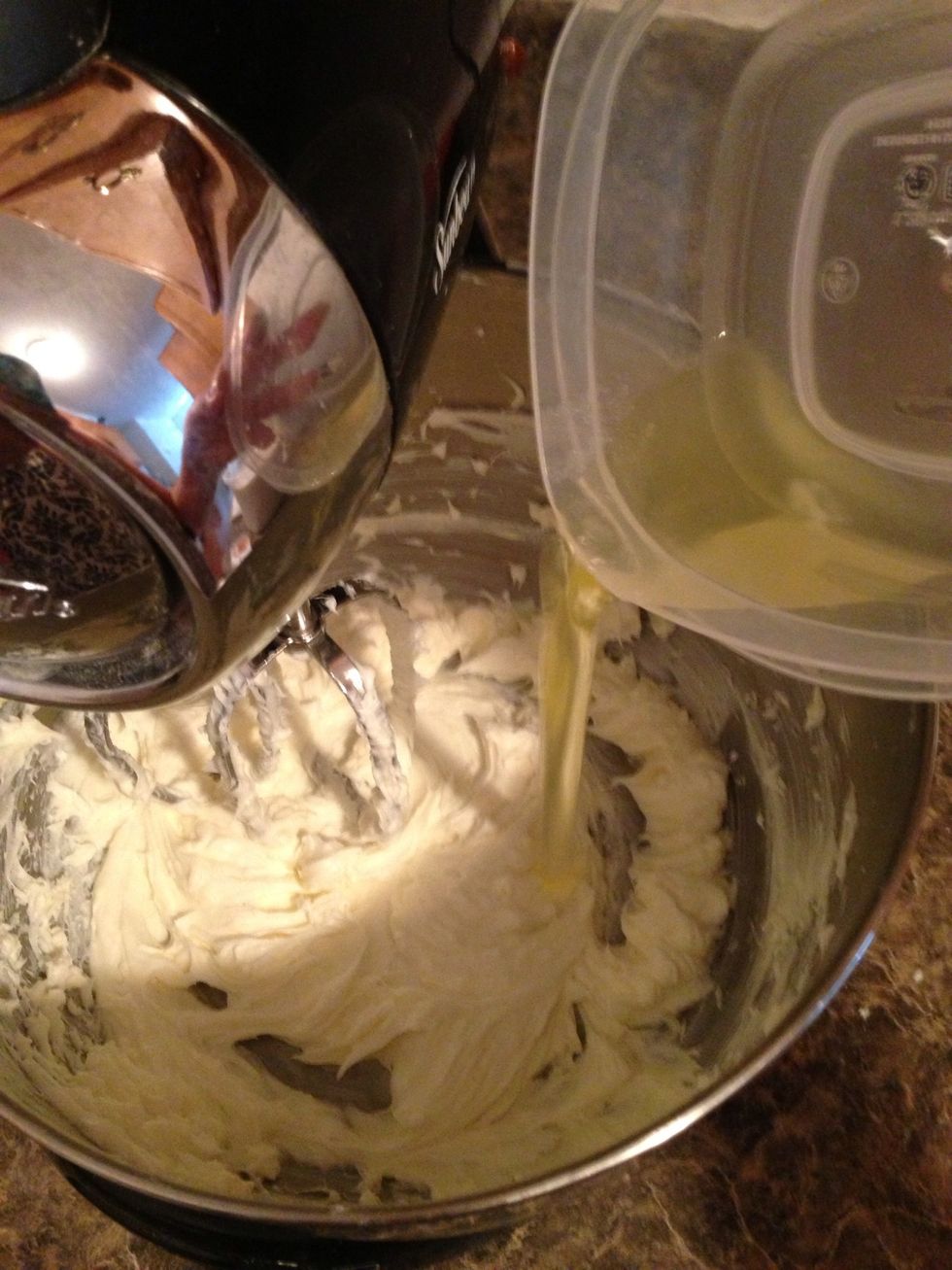 Add in that second egg white. Continue mixing until the egg is mixed completely into the mixture. You thought we forgot about it didn't you!