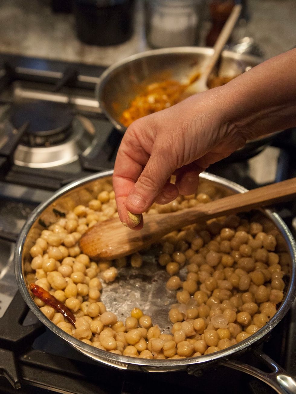 Add in the 1/2 tsp of salt, and a pinch of hing.