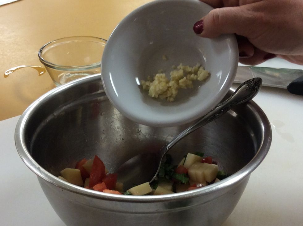 Add in the 2 cloves of minced garlic.