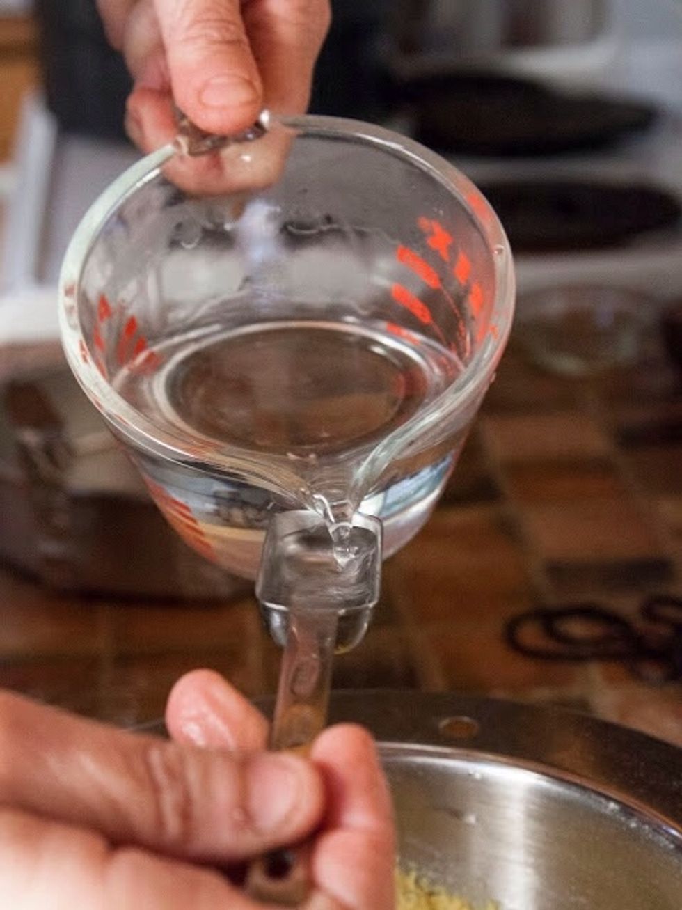 Add in the 3 Tbs of warm water, once again stirring in 1 Direction only.