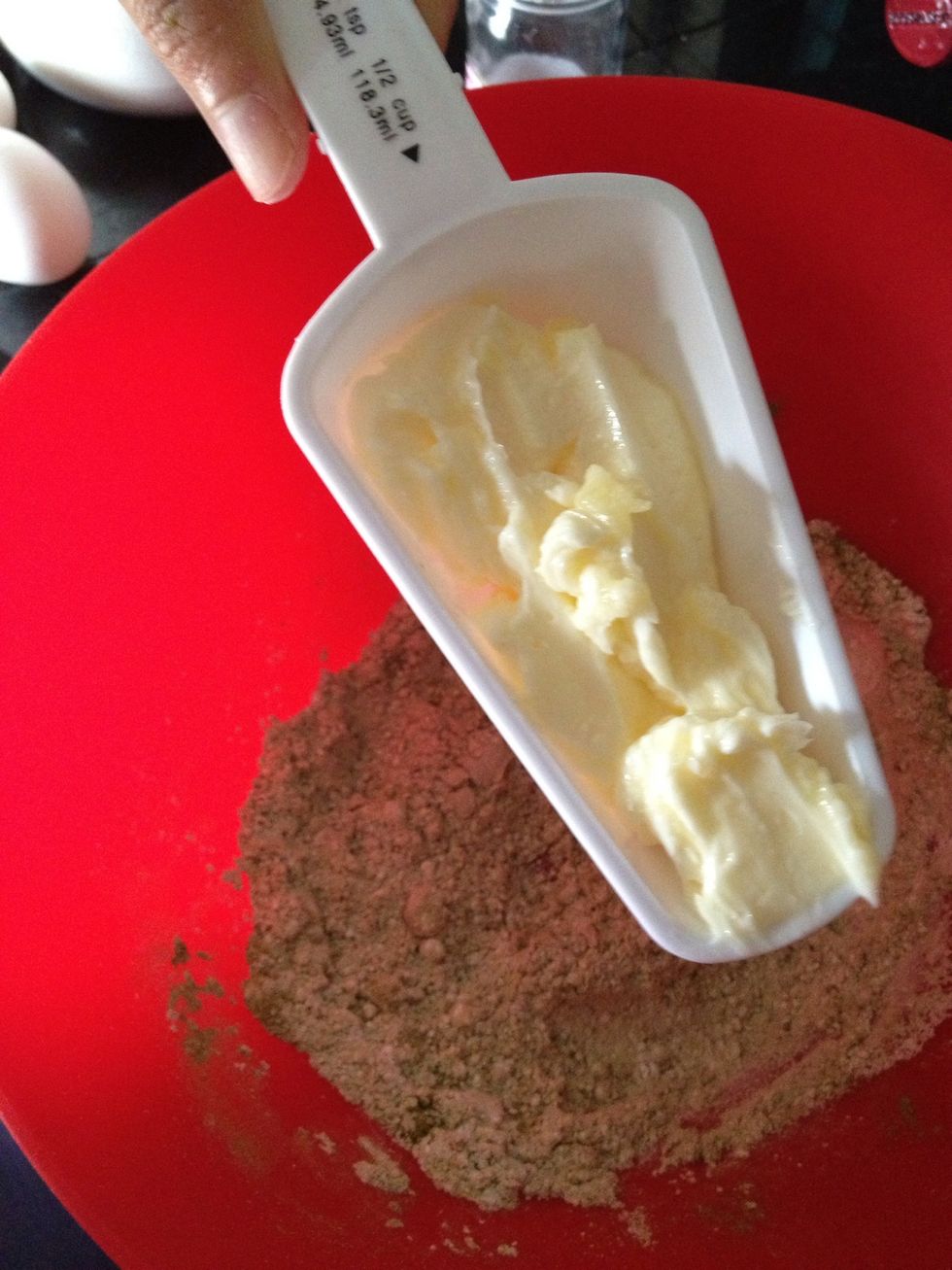 Add in the butter, beating on low speed until smooth and uniformly green in color.