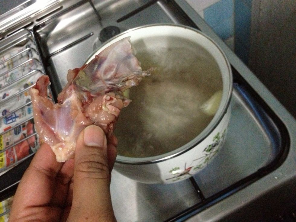 Add in the chicken bones