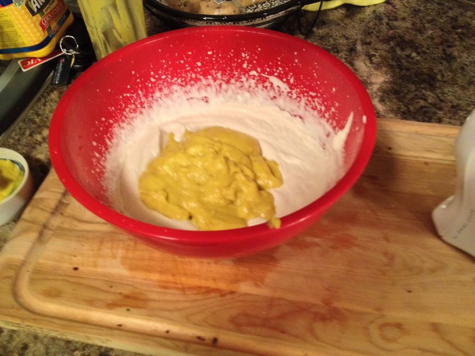 Add in the cooled banana mixture to the whipped cream.