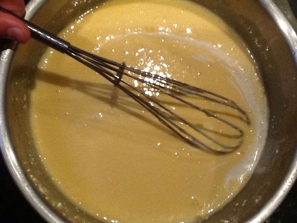 Add in the cream and keep whisking