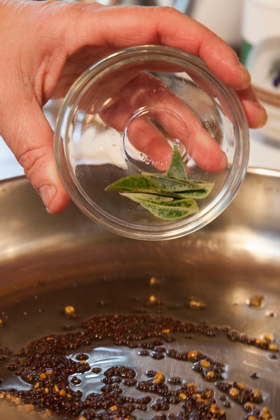 Add in the curry leaves.