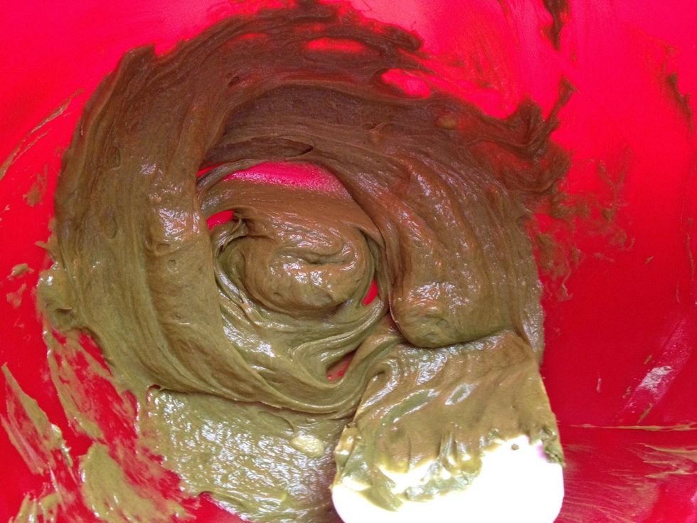 Add in the egg yolks one at a time, beating until combined.