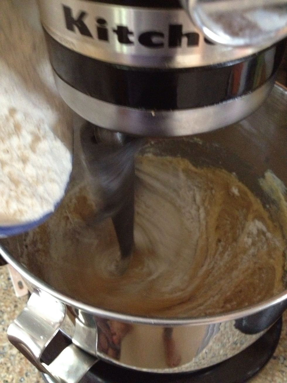 Add in the flour, a little at a time, so you can give the dough a chance to thicken up slowly.