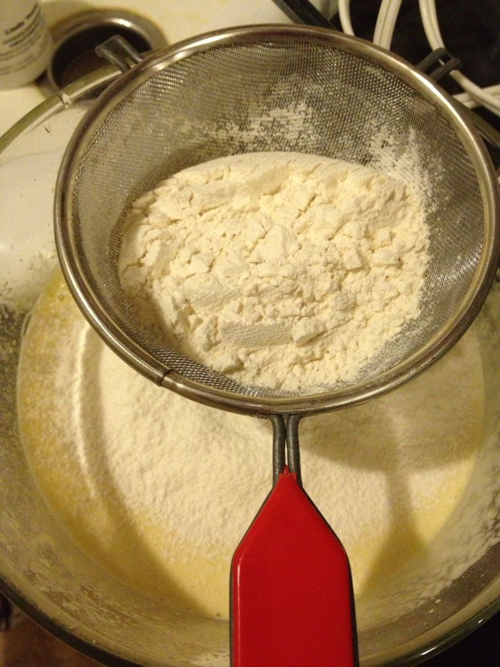 Add in the flour and use a spatula and mix well