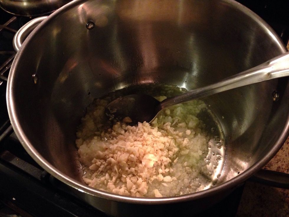 Add in the garlic, saut\u00e9 for 2 more minutes.