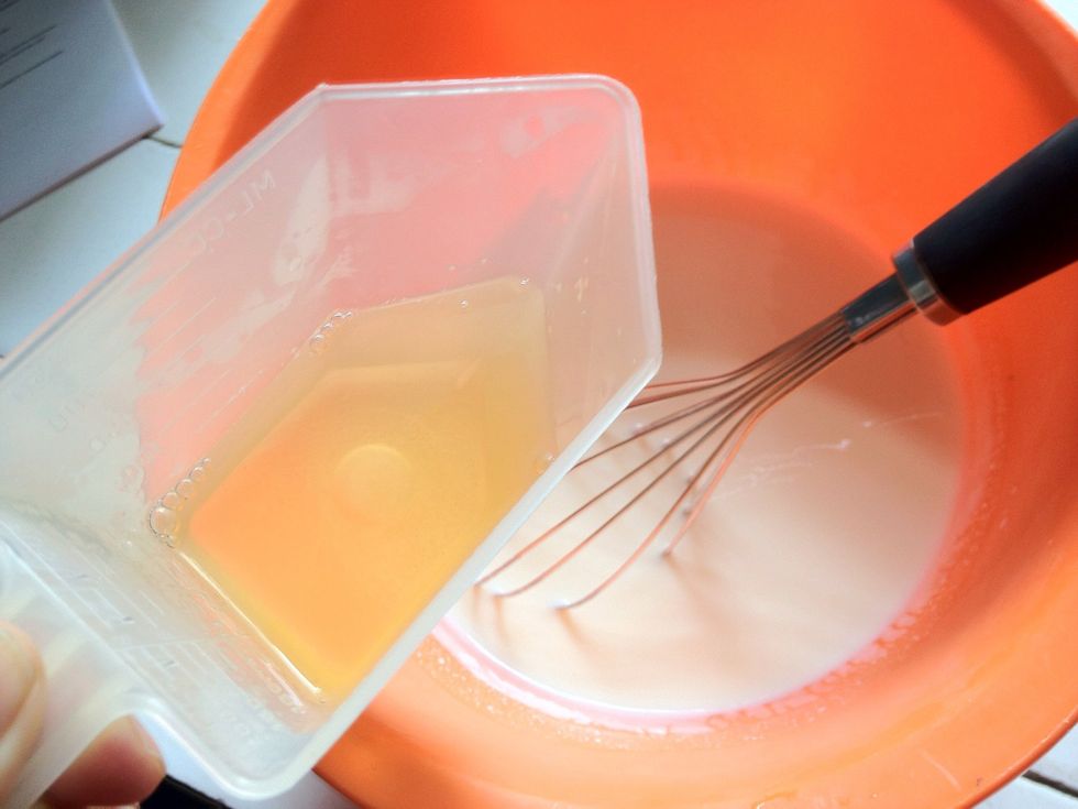 Add in the gelatin into the milk-yoghurt mixture. Stir in constantly until well combined