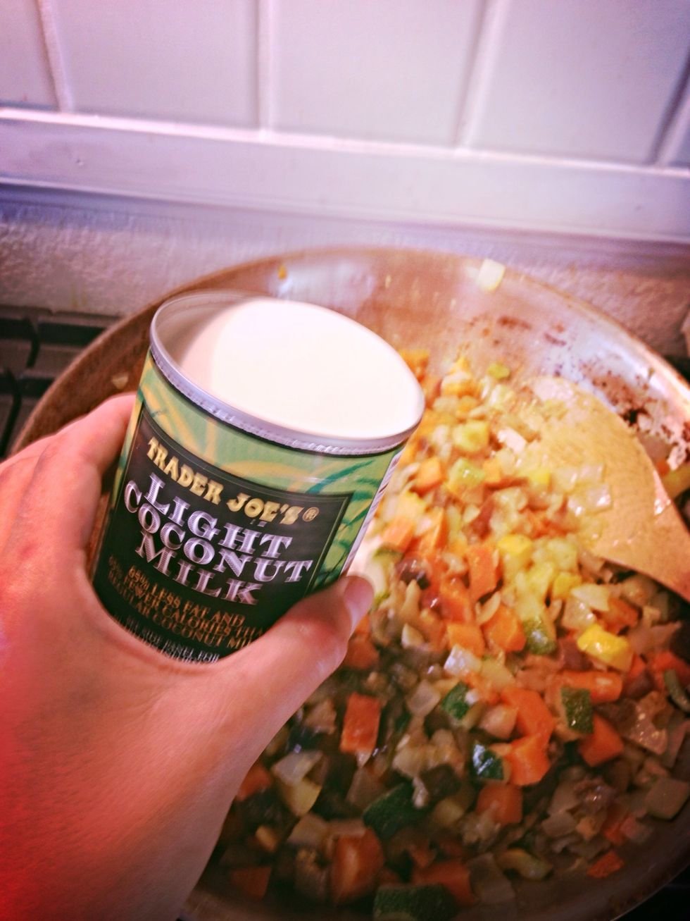 Add in the light coconut milk. And stir.