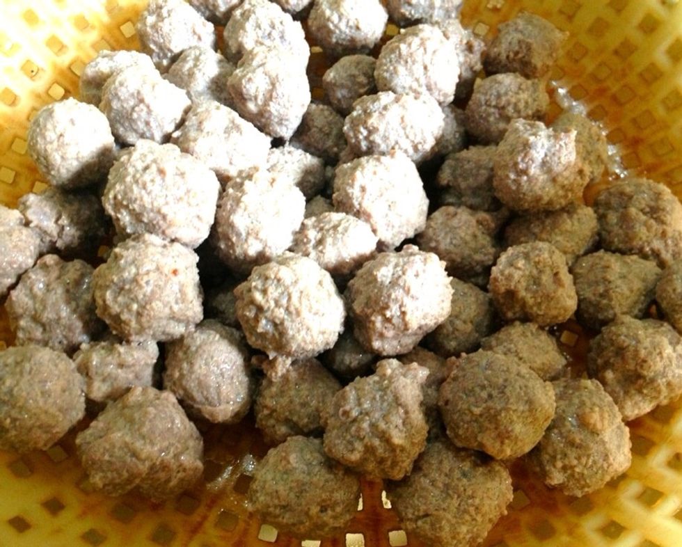 Add in the meatballs and cook until they start to float, turn off the heat. Drain and set aside. This will reduce the fat. Note: some people like to use the stock for later, so dont discard the stock